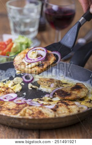 Bavarian Dumpling Groestl With Eggs In A Pan