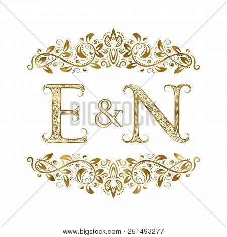 E And N Vintage Initials Logo Symbol. The Letters Are Surrounded By Ornamental Elements. Wedding Or 