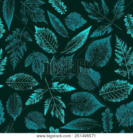 Abstract Botanical Pattern. Seamless Print Composed Of Blue And Green Stamps Of Leaves On Black Back