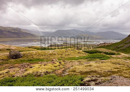Wide Angle Mossy Landscape Of Lonsoraefi, Iceland With Overcast Weather