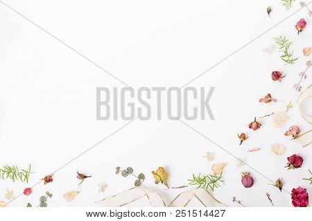 Flowers Composition. Frame Made Of Dried Rose Flowers On White Background. Flat Lay, Top View, Copy 