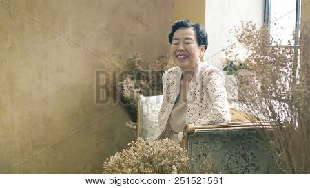 Asian Elderly Woman Sit In Beautiful Luxury Interior Room Tuscan Vintage Style