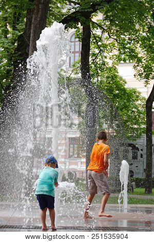 Gomel, Belarus Children Bathing In The Fountain. Square Named After Gromyko