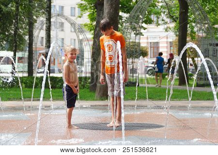 Gomel, Belarus Children Bathing In The Fountain. Square Named After Gromyko