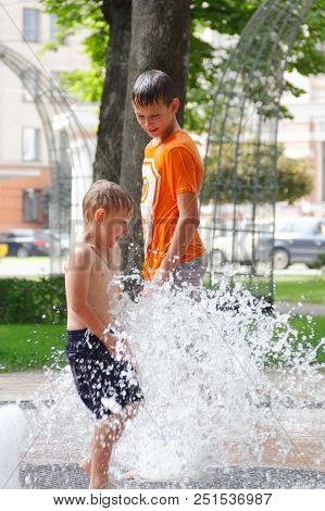 Gomel, Belarus Children Bathing In The Fountain. Square Named After Gromyko