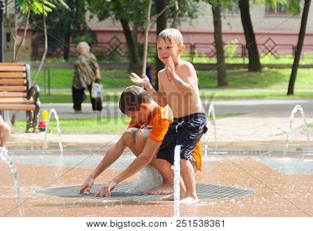Gomel, Belarus Children Bathing In The Fountain. Square Named After Gromyko