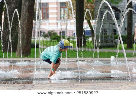 Gomel, Belarus Children Bathing In The Fountain. Square Named After Gromyko