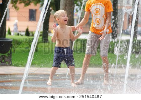 Gomel, Belarus Children Bathing In The Fountain. Square Named After Gromyko