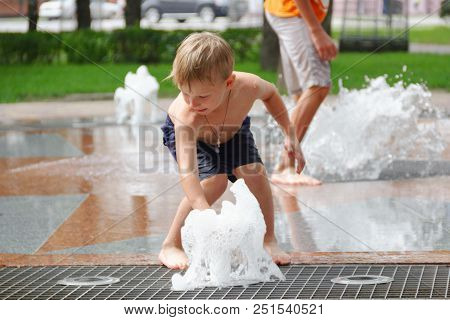 Gomel, Belarus Children Bathing In The Fountain. Square Named After Gromyko