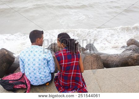 MUMBAI, INDIA - JULY 2 2018: Unidentified people visit promenade in South Mumbai. 
The promenade is an open space where people could meet friends and just spend time