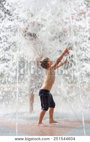 Gomel, Belarus Children Bathing In The Fountain. Square Named After Gromyko