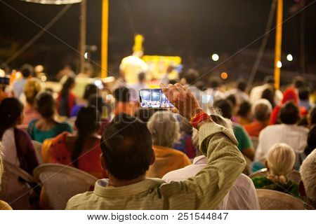 VARANASI, UTTAR PRADESH, INDIA - JULY 6, 2018: Ganga Aarti ceremony at Dasashvamedh Ghat with thousand of prayers each evenning.