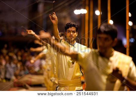 VARANASI, UTTAR PRADESH, INDIA - JULY 6, 2018: Ganga Aarti ceremony at Dasashvamedh Ghat with thousand of prayers each evenning.