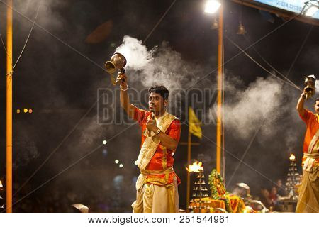 VARANASI, UTTAR PRADESH, INDIA - JULY 6, 2018: Ganga Aarti ceremony at Dasashvamedh Ghat with thousand of prayers each evenning.