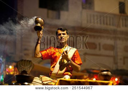 VARANASI, UTTAR PRADESH, INDIA - JULY 6, 2018: Ganga Aarti ceremony at Dasashvamedh Ghat with thousand of prayers each evenning.