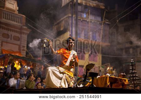 VARANASI, UTTAR PRADESH, INDIA - JULY 6, 2018: Ganga Aarti ceremony at Dasashvamedh Ghat with thousand of prayers each evenning.
