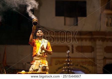 VARANASI, UTTAR PRADESH, INDIA - JULY 6, 2018: Ganga Aarti ceremony at Dasashvamedh Ghat with thousand of prayers each evenning.