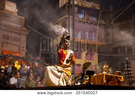 VARANASI, UTTAR PRADESH, INDIA - JULY 6, 2018: Ganga Aarti ceremony at Dasashvamedh Ghat with thousand of prayers each evenning.