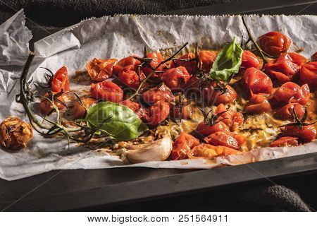 Roasted Cherry Tomotoes. Mediterranean Food Recipe Idea.