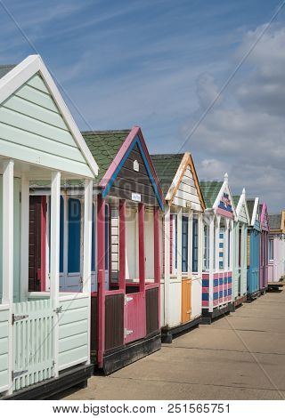 A Row Of Colourful Beach Huts In The Seaside Town Of Southwold, Suffolk Uk