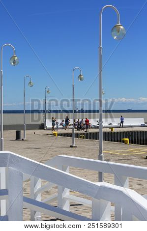 Sopot, Poland - June 6, 2018: Wooden Sopot Pier In Sunny Day. It Is The Longest Wooden Pier In Europ