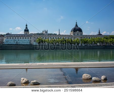 View Of Rhone River With Grand Hotel Dieu After 2018 Renovation And Fourviere Cathedral In Lyon City