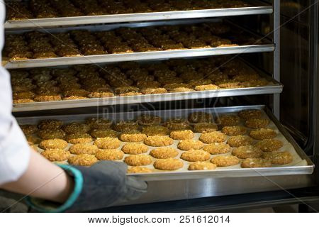 Tasty Cookies Being Baked In An Oven