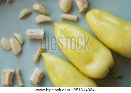 Bulgarian Green Yellow Paprika Pepper On The Table For Harvesting And Preserving Closeup.