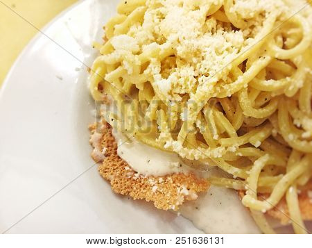 Close Up Of A Portion Of Tonnarelli Pasta With Traditional Cheese And Pepper Sauce