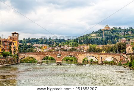 Ponte Pietra Stone Bridge Up On The Adige River In Verona, Italy. Historic, Famous.