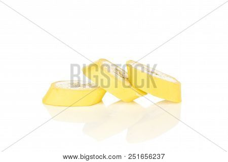 Group Of Three Slices Of Fresh Yellow Banana Isolated On White Background