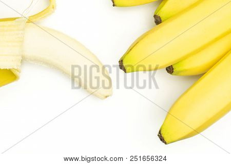 Lot Of Whole Fresh Yellow Banana And One Opened Flatlay Isolated On White Background