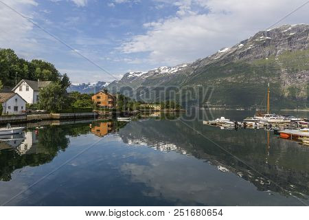 View Of Sor Fjord From Lofthus With A Beautiful Reflection Of Mountains In The Background, Norway
