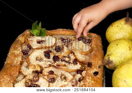 Pie With Pear And Cinnamon, Child's Hand In The Frame. Autumn Baking.