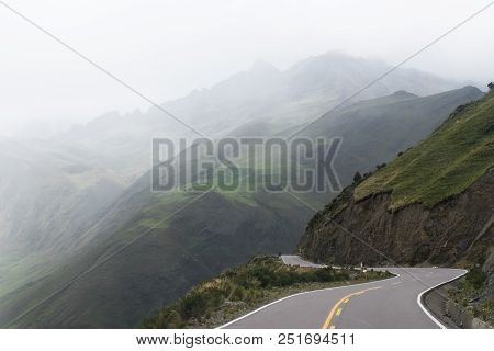 A Winding Road Stretching Into The High Misty Mountains