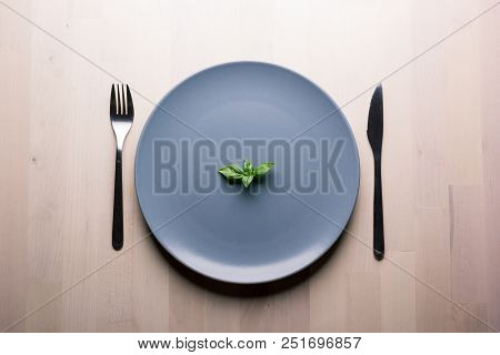 Top View Of A Restaurant Table With Plate, Knife And Fork, Restaurant Concept