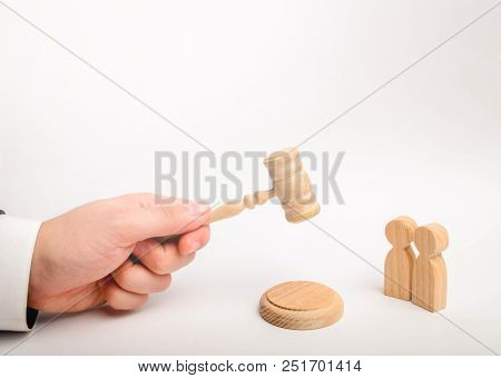 Two Men And A Hammer Of The Judge. The Trial Of Cases In Court, The Resolution Of A Dispute Between 