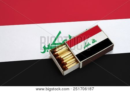 Iraq Flag  Is Shown In An Open Matchbox, Which Is Filled With Matches And Lies On A Large Flag.