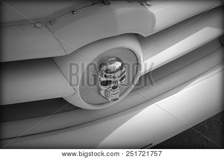 Closeup Of A Vintage Car With Skull