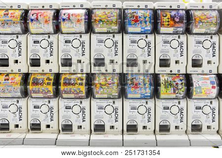 Tokyo, Japan - March 1, 2018 : Gachapon, Row Of White Japanese Capsule Toy Vending Machine In Narita