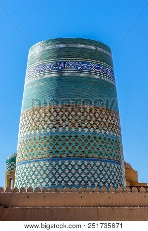 Bukhara, Uzbekistan - September 15, 2013: Unfinished Turquoise-tiled Kalta Minor Minaret At Ichan Qa