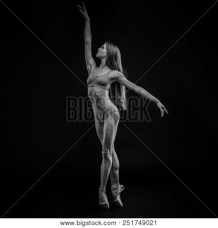 Ballerina. Young graceful woman ballet dancer, dressed in profes