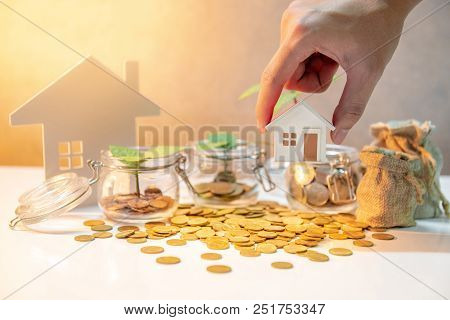 Property Or Real Estate Investment. Home Mortgage Loan Rate. Saving Money For Future Concept. Male H