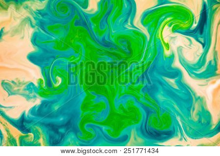 Abstract Colors, Backgrounds And Textures. Food Coloring In Milk. Food Coloring In Milk Creating Bri