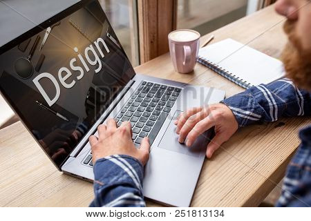 Cropped Image Of A Young Man Working On His Laptop In A Coffee Shop, Rear View Of Business Man Hands