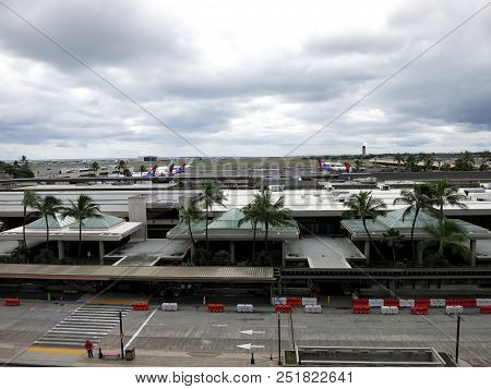 Honolulu - October 13, 2015: Aerial View Of Planes, Terminal, And Roads Leading Into Airport At The 
