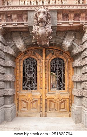 Fragment Of An Old Oak Arched Double-leafed Door.