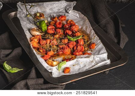 Roasted Cherry Tomotoes. Mediterranean Food Recipe Idea.