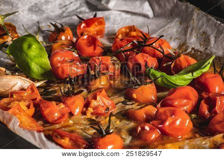 Roasted Cherry Tomotoes. Mediterranean Food Recipe Idea.