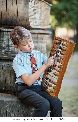 Boy With Large Abacus